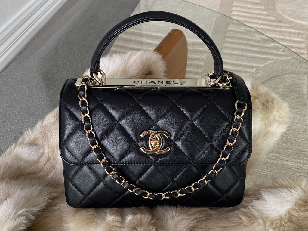 black chanel bag with red handle