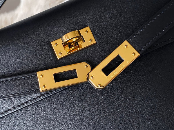 Hermès Noir Swift Kelly Pochette GHW