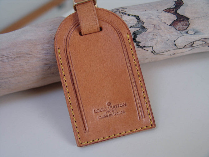 Louis vuitton 2024 leather tag