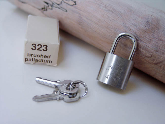 Louis Vuitton Padlock Brushed Palladium Number 323 | BNIB