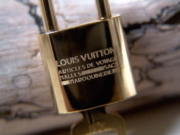 Louis Vuitton Padlock Articles de Voyage Gold-Tone Number 320