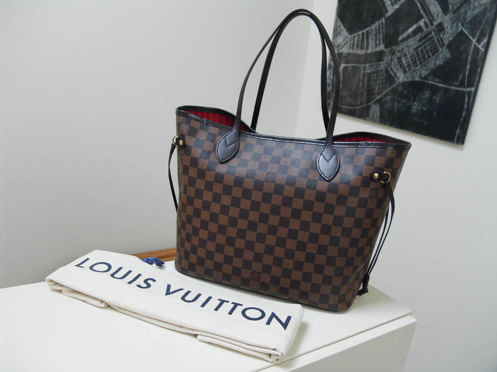 Removing gold initials heat stamp from a Louis Vuitton Neverfull 