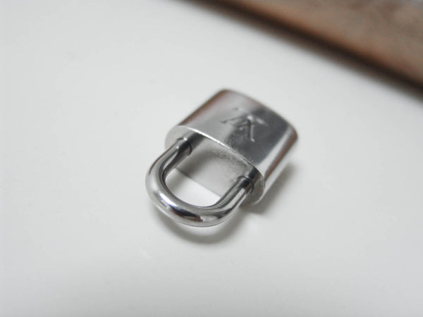 Louis Vuitton Padlock Silver-Tone Number 437