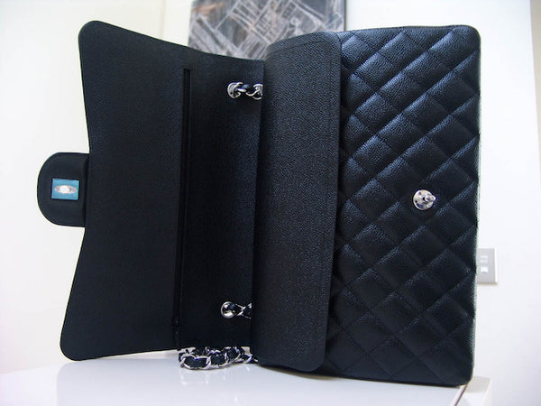 Chanel Black Caviar Maxi Classic Double Flap SHW | 23 Series
