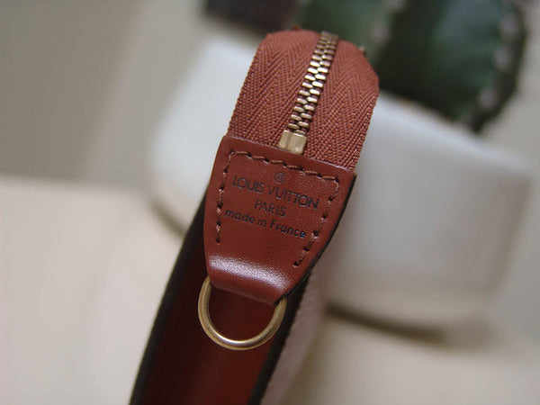 Louis Vuitton Epi Leather Pochette Accessoires in Kenyan Fawn