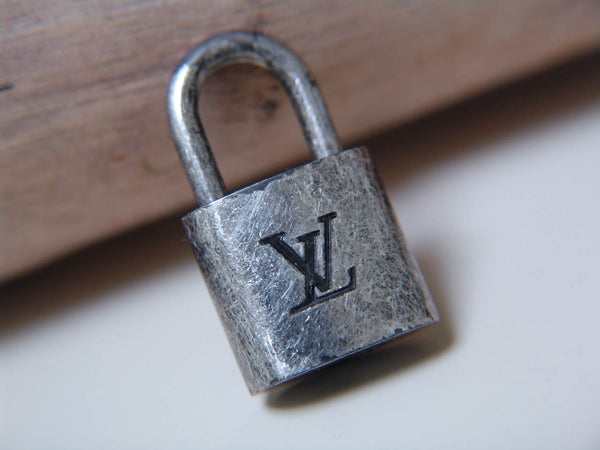Louis Vuitton Padlock Marbled Silver-Tone Number 301